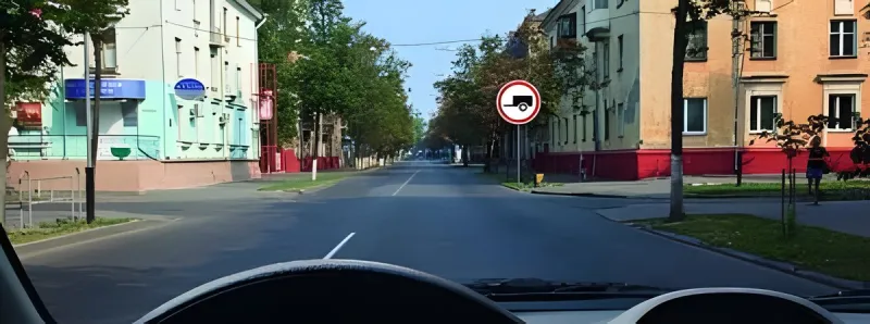 Question 8: Is a passenger car towing a trailer permitted to proceed straight ahead through the inters