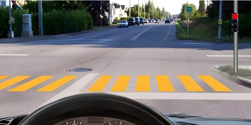 Question 14: Where must the driver stop in this situation?
