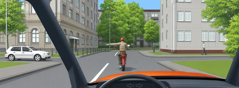 Question 19: What is the driver of the motorcycle indicating?